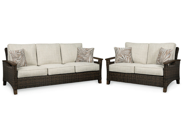 Side angle of Paradise outdoor loveseat with brown resin wicker