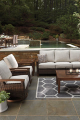 Paradise Trail Medium Brown Outdoor Sofa with cushions and pillows detail