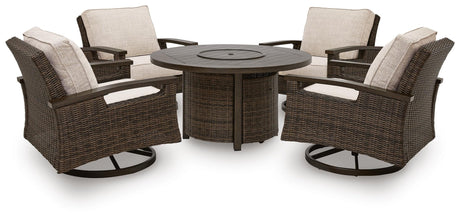Monterey fire pit table with flame burning at night