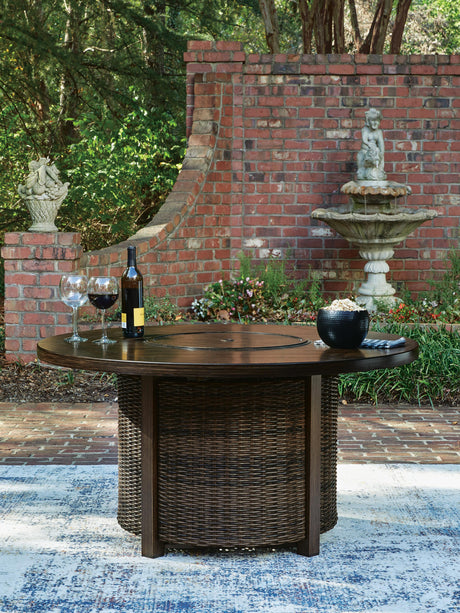 Close-up of resin wicker and aluminum tabletop