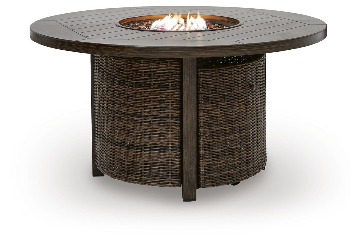 Burner with glass beads illuminated in the fire pit table