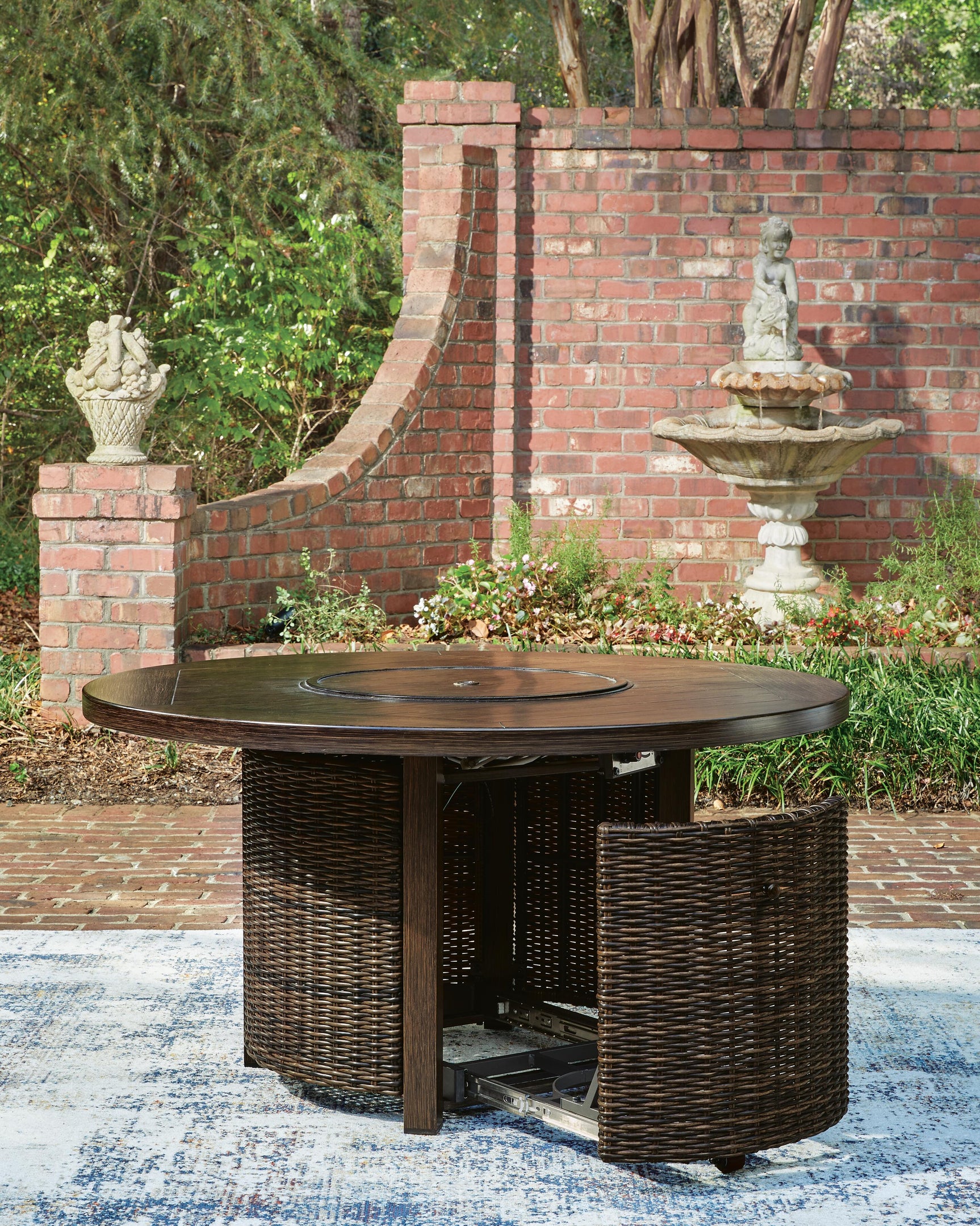 Storage feature under the fire pit table