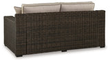 Coastline Bay outdoor loveseat brown resin wicker texture close-up