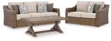 Loveseat side view showing beige cushions