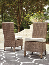 Beachcroft Beige Outdoor Dining Set with table, bench, and four chairs