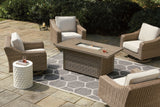 Fire pit table lit with stainless steel burner