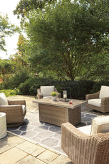 Outdoor dining set arranged for evening use