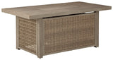 Beachcroft Beige Fire Pit Table with cabinet door open revealing shelves