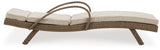 Beachcroft beige outdoor chaise lounge flat position