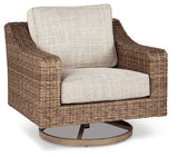 Outdoor sofa from Beachcroft beige set showing driftwood-inspired frame