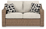 Beachcroft Beige Outdoor Loveseat head-on view
