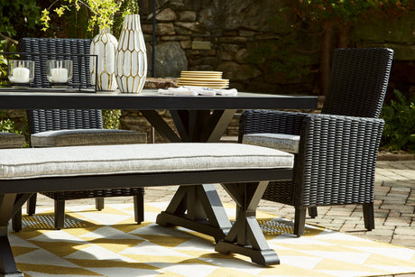 Beachcroft Outdoor Dining Table styled in outdoor setting horizontal