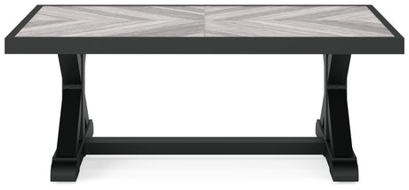 Side view of Beachcroft black framed lounge chair with cushion