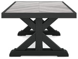 Two Beachcroft end tables next to lounge chairs
