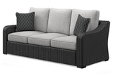 Beachcroft outdoor sofa set with black frame and light gray cushions from front angle