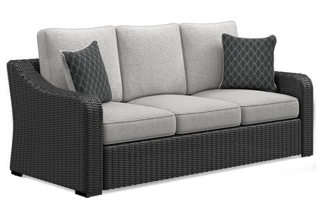 Beachcroft outdoor sofa set with black frame and light gray cushions