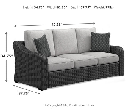Beachcroft outdoor sofa set with black frame and light gray cushions