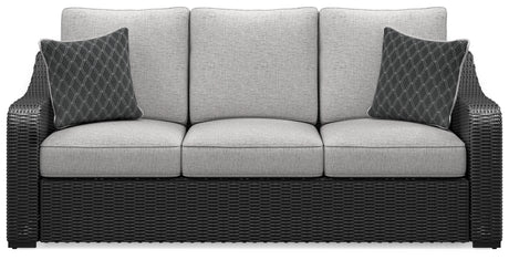 Beachcroft outdoor sofa set with black frame and light gray cushions from front angle