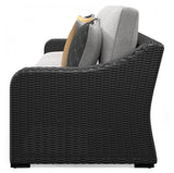 Beachcroft loveseat assembled showing full seating and throw pillows