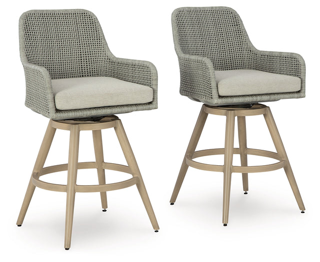 Seton Creek outdoor swivel barstool in beige and gray, angled view