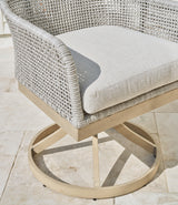 Seton White Creek outdoor dining table with 4 white wicker chairs