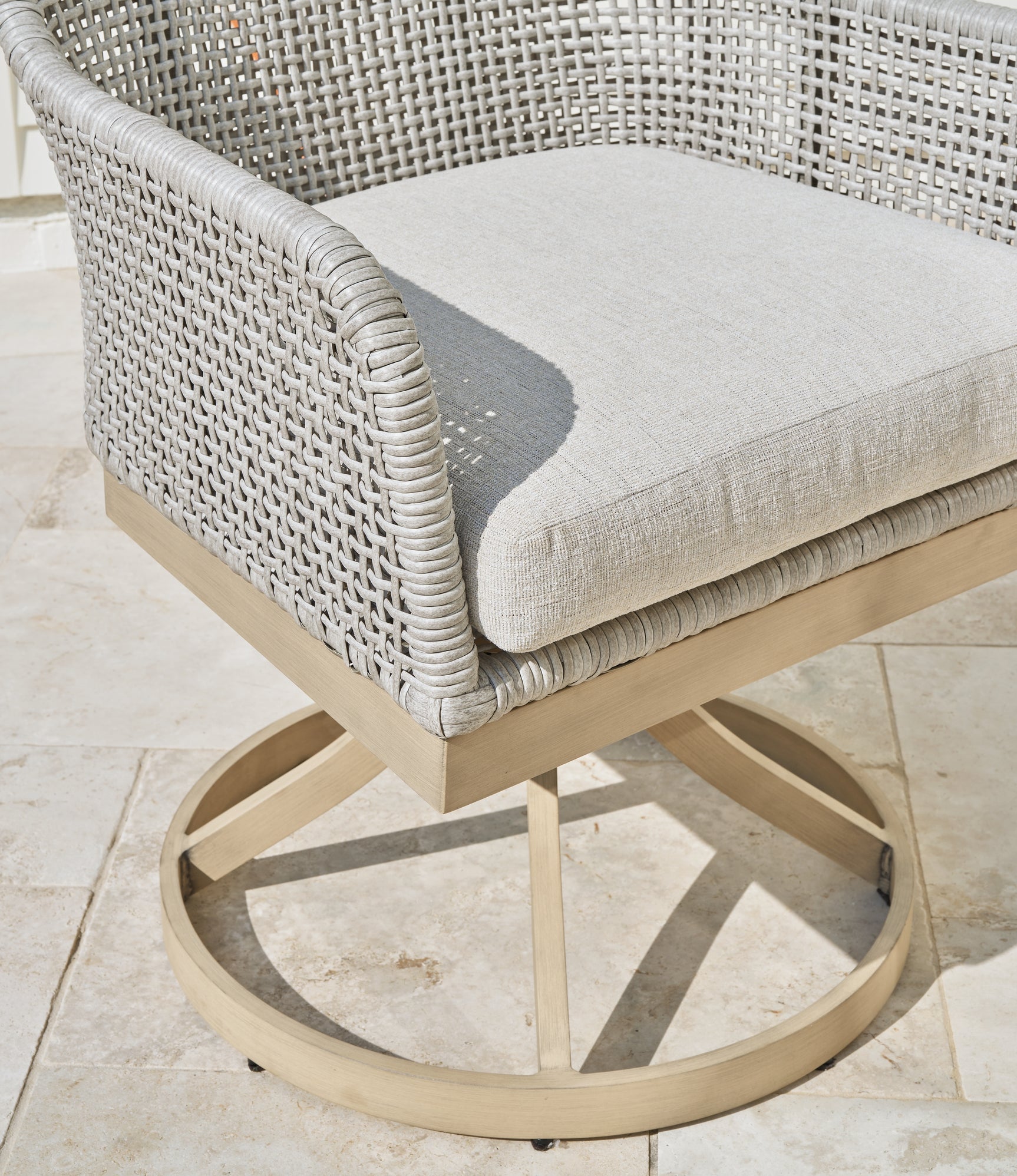 Seton White Creek outdoor dining table with 4 white wicker chairs