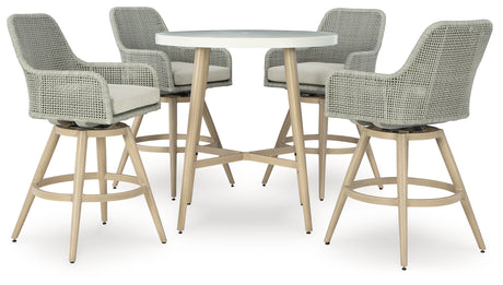 Seton Beige Creek outdoor bar table with 4 beige resin wicker barstools from front angle