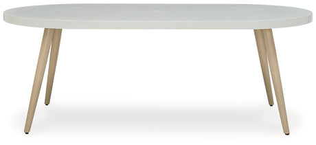 Seton White Creek outdoor dining table with 4 white wicker chairs