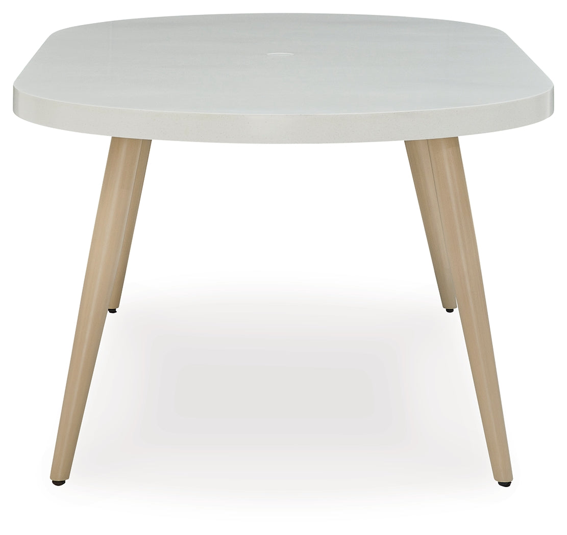 Seton White Creek outdoor dining table with 4 white wicker chairs
