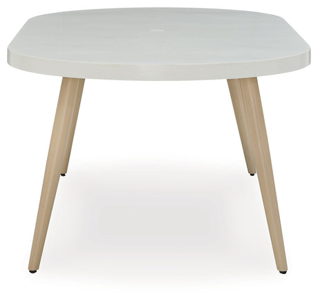 Seton White Creek outdoor dining table with 4 white wicker chairs