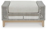Seton Creek Gray Outdoor Ottoman with Cushion side angle