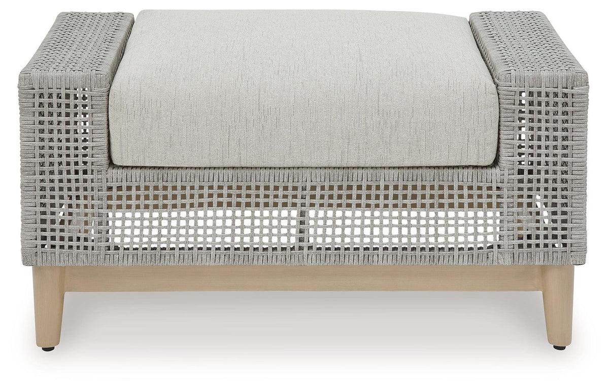 Seton Creek Gray Outdoor Ottoman with Cushion side angle