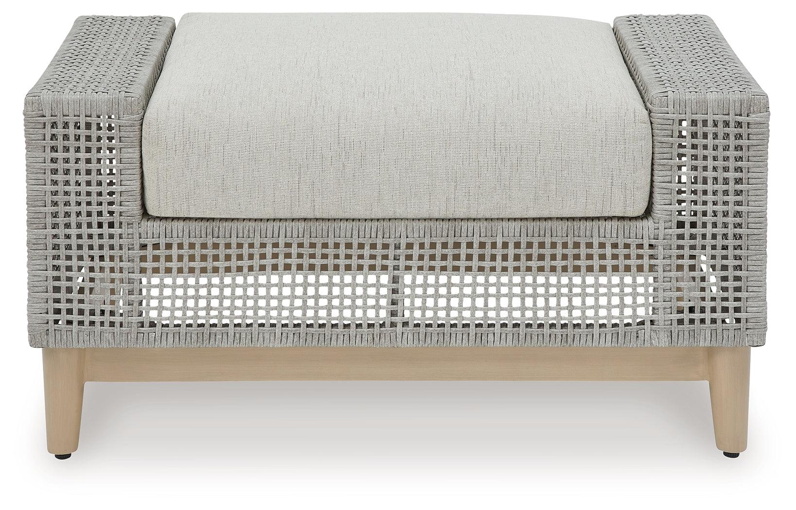 Seton Creek Gray Outdoor Ottoman with Cushion side angle