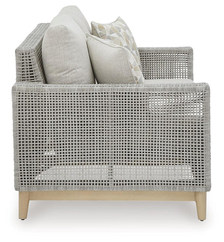 Seton Creek gray outdoor loveseat with cushion side angle