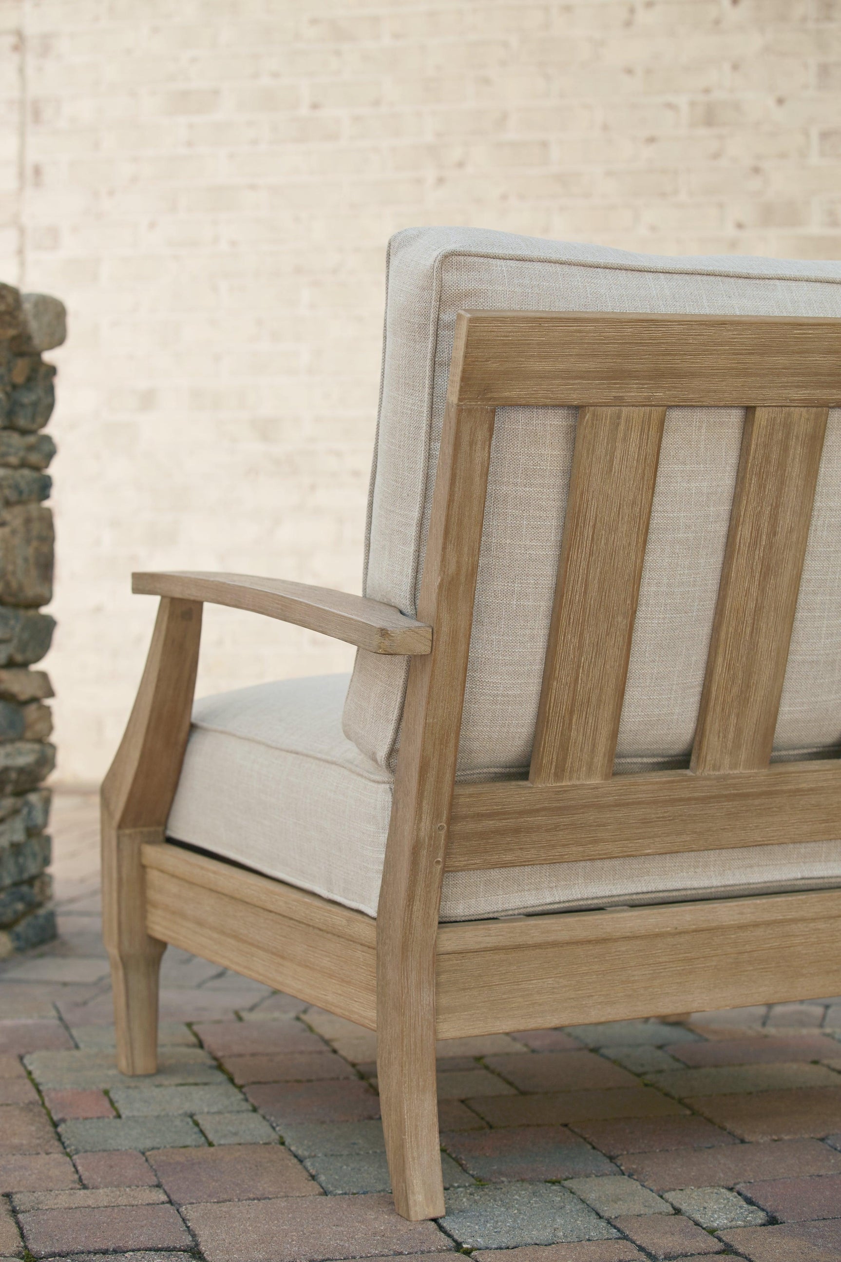 Clare View beige outdoor lounge chair detailed leg view