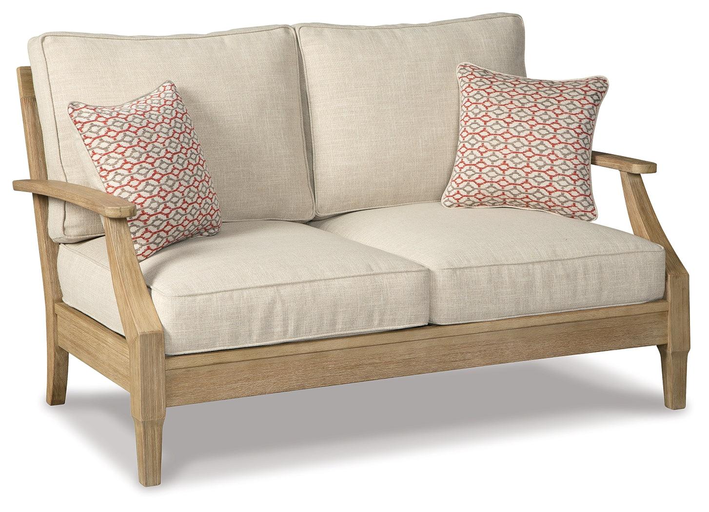 Clare View beige outdoor loveseat side angle showing frame