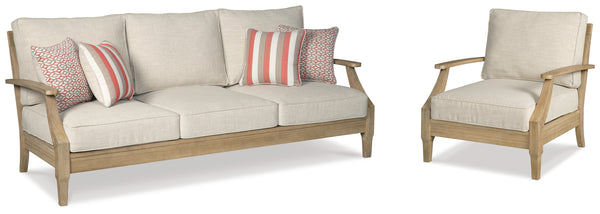 Clare beige lounge chair with eucalyptus wood frame angled side view