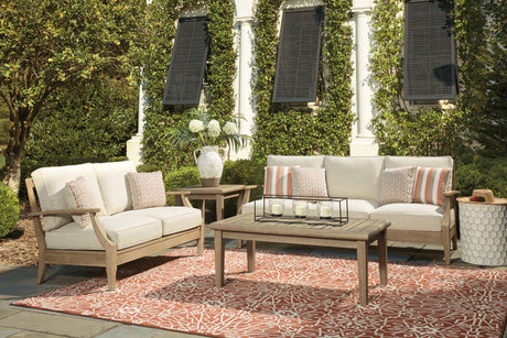 Beige cushioned outdoor sofa close up