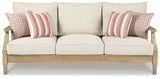 Cushions and pillows on outdoor loveseat