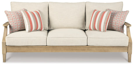 Cushions and pillows on outdoor loveseat