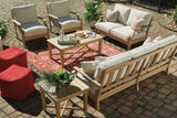 Clare View Beige Sofa styled with neutral pillows outdoors