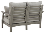 Visola Gray Outdoor Loveseat with throw pillows close-up