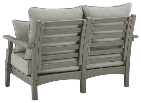 Visola Gray Outdoor Loveseat with throw pillows close-up