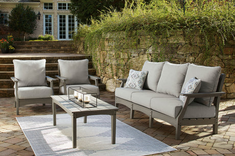 Gray outdoor chair from Visola set showing cushion detail
