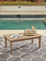 Side view of grayish brown end table in the Gerianne set