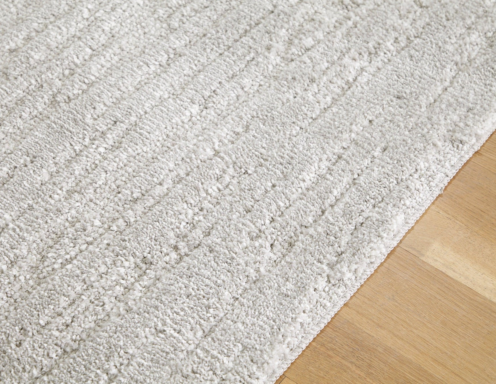 Ivygail Gray 7'5" X 9'6" Rug - Ella Furniture