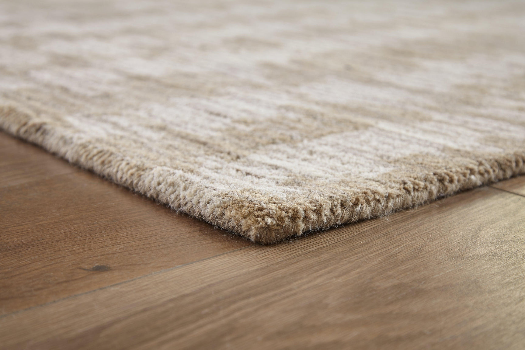 Close-up of Abanlane Brown and Cream Wool Rug texture