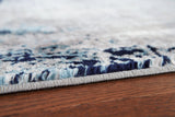 Leonelle Cream Blue Gray 5'3 x 7'3 Rug texture close-up