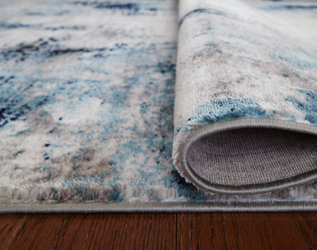 Detail of Leonelle rug edge highlighting machine weave and 9mm pile