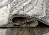 Wysdale Ivory and Gray abstract medium rug 5'3" x 7'3" rolled edge detail